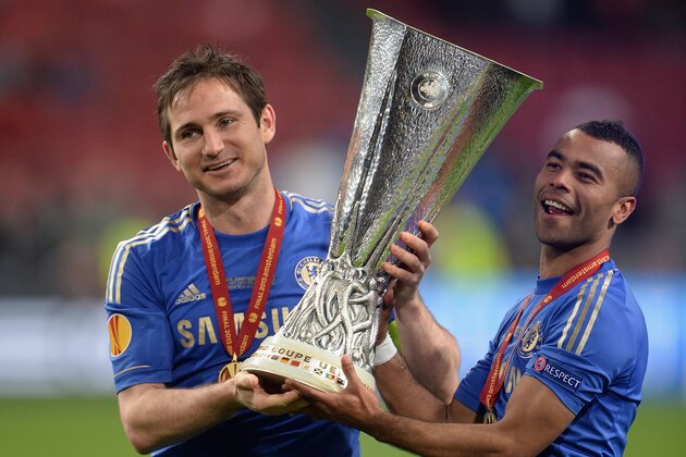 AMSTERDAM, NETHERLANDS - MAY 15:  Frank Lampard and Ashley Cole of Chelsea pose with the trophy during the UEFA Europa League Final between SL Benfica and Chelsea FC at Amsterdam Arena on May 15, 2013 in Amsterdam, Netherlands.  (Photo by Michael Regan/Getty Images)