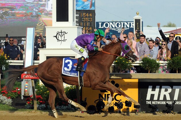 IMAGE DISTRIBUTED FOR LONGINES - California Chrome, ridden by jockey Victor Espinoza, wins the second leg of the Triple Crown as he runs away with the 139th Preakness Stakes, Saturday, May 17, 2014, in Baltimore, MD. Longines, the Swiss watchmaker known for its famous timepieces, is the Official Watch and Timekeeper of the 139th annual Preakness Stakes and the Triple Crown. (Diane Bondareff/Invision for Longines/AP Images)