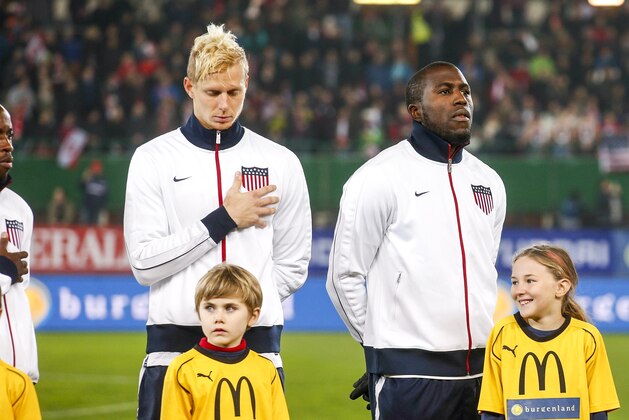 VIENNA, AUSTRIA - NOVEMBER 19:  Brek Shea, Jozy Altidore and Aron Johannsson of USA (L-R) line up for the national anthem prior to the International friendly match between Austria and USA at the Ernst-Happel Stadium on November 19, 2013 in Vienna, Austria.  (Photo by Christian Hofer/Getty Images)
