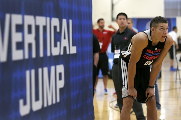 Aaron Gordon, from Arizona, waits to participate in the running vertical jump at the 2014 NBA basketball draft combine Friday, May 16, 2014, in Chicago. (AP Photo/Charles Rex Arbogast)