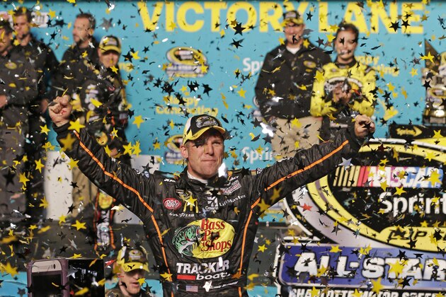 Jamie McMurray celebrates in Victory Lane after winning the NASCAR Sprint All-Star auto race at Charlotte Motor Speedway in Concord, N.C., Saturday, May 17, 2014. (AP Photo/Chuck Burton)