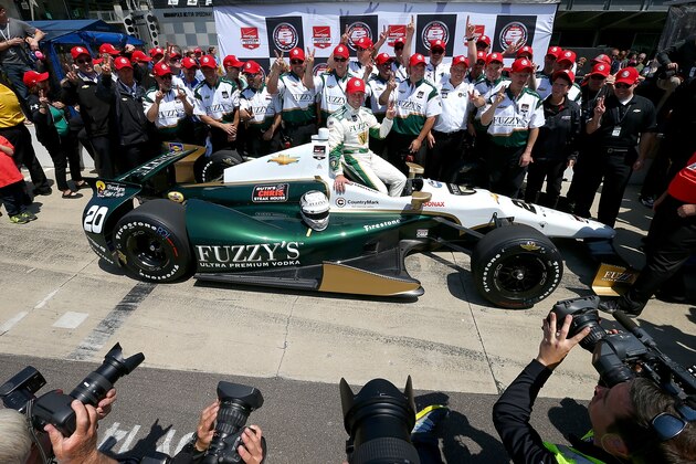 INDIANAPOLIS - MAY 18:  Ed Carpenter, driver of the #20 Fuzzy's Vodka Ed Carpenter Racing Chevrolet Dallara poses for a photo after winning the pole position for the 98th Indianapolis 500 Mile Race on May 18, 2014 at the Indianapolis Motor Speedway in Indianapolis, Indiana.  (Photo by Jonathan Ferrey/Getty Images)