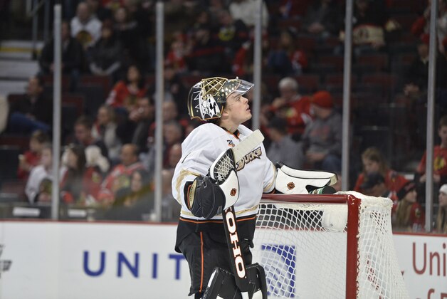 Anaheim Ducks goalie Jonas Hiller gets ready for the second period of an NHL hockey game against the Anaheim Ducks, Friday, Dec. 6, 2013 in Chicago. The Ducks defeated the Blackhawks 3-2 in a shootout.  (AP Photo/Brian Kersey)