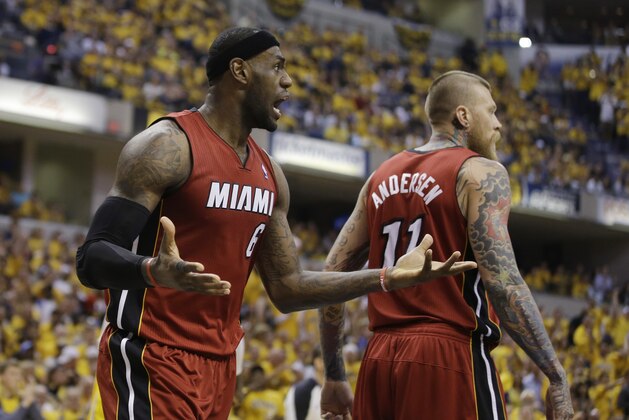 Miami Heat's LeBron James (6) reacts after his teammate Chris Andersen (11) was called for a foul during the second half of Game 1 of the Eastern Conference finals NBA basketball playoff series against the Indiana Pacers Sunday, May 18, 2014, in Indianapolis. Indiana defeated Miami 107-96. (AP Photo/Darron Cummings)
