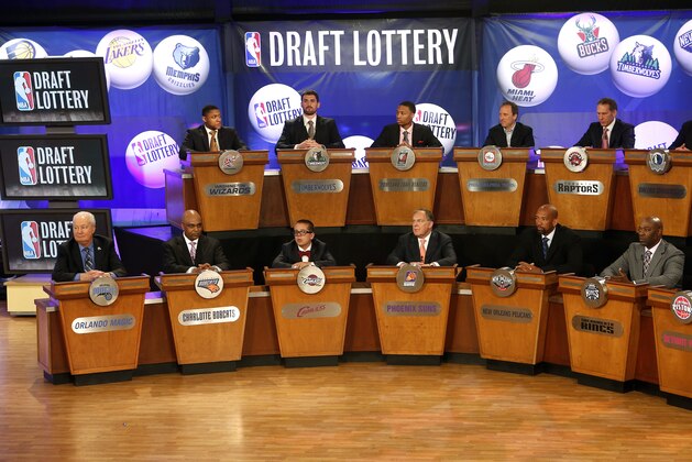 NBA basketball team representatives sit onstage at the start of the NBA draft lottery, Tuesday, May 21, 2013 in New York. (AP Photo/Jason DeCrow)