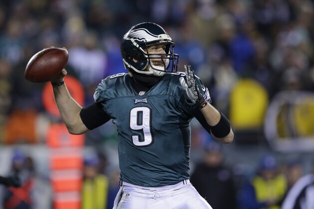 Philadelphia Eagles' Nick Foles in action during the first half of an NFL wild-card playoff football game against the New Orleans Saints, Saturday, Jan. 4, 2014, in Philadelphia. (AP Photo/Michael Perez)
