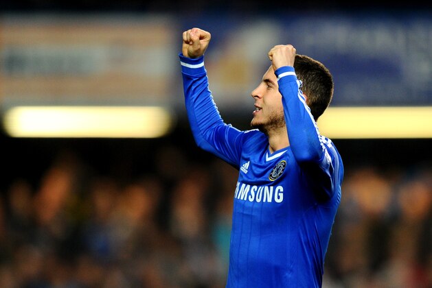 LONDON, ENGLAND - MARCH 08:  Eden Hazard of Chelsea celebrates after scoring his team's second goal from the penalty spot during the Barclays Premier League match between Chelsea and Tottenham Hotspur at Stamford Bridge on March 8, 2014 in London, England.  (Photo by Mike Hewitt/Getty Images)