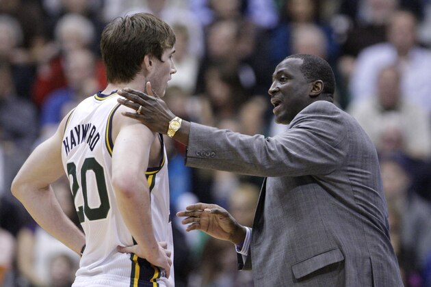 Utah Jazz head coach Tyrone Corbin talks with Utah Jazz shooting guard Gordon Hayward (20) in the second half during an NBA basketball game against the Los Angeles Clippers Monday, Dec. 3, 2012, in Salt Lake City. (AP Photo/Rick Bowmer)