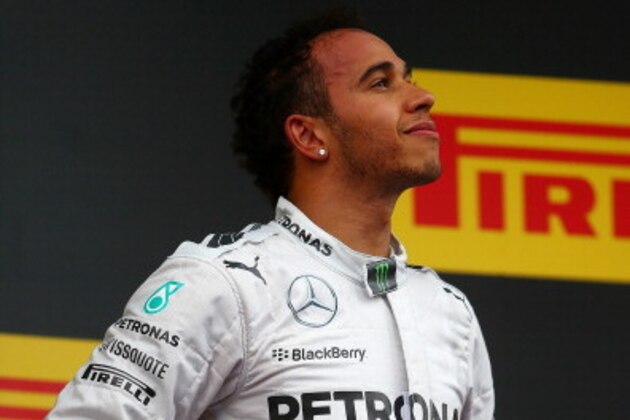 MONTMELO, SPAIN - MAY 11:  Lewis Hamilton of Great Britain and Mercedes GP celebrates on the podium during the Spanish Formula One Grand Prix at Circuit de Catalunya on May 11, 2014 in Montmelo, Spain.  (Photo by Paul Gilham/Getty Images)