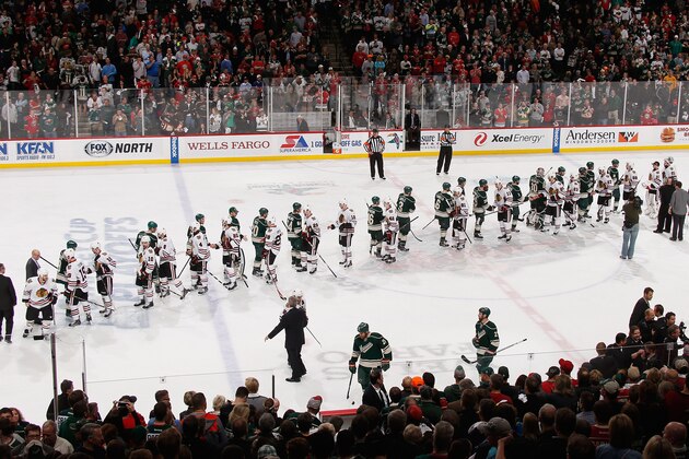 ST. PAUL, MN - MAY 13: The Minnesota Wild and Chicago Blackhawks shake hands following Game Six of the Second Round of the 2014 Stanley Cup Playoffs on May 13, 2014 at the Xcel Energy Center in St. Paul, Minnesota. (Photo by Bruce Kluckhohn/NHLI via Getty Images)