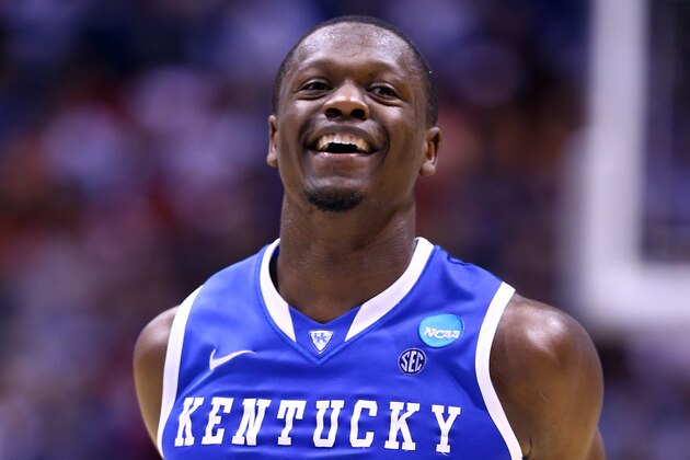INDIANAPOLIS, IN - MARCH 28:  Julius Randle #30 of the Kentucky Wildcats celebrates defeating the Louisville Cardinals 74 to 69 during the regional semifinal of the 2014 NCAA Men's Basketball Tournament at Lucas Oil Stadium on March 28, 2014 in Indianapolis, Indiana.  (Photo by Andy Lyons/Getty Images)