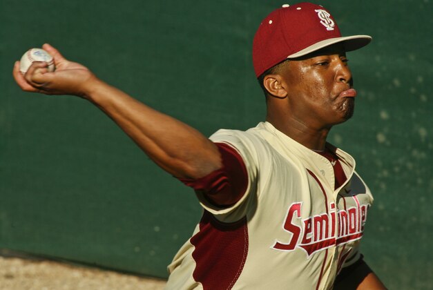 Florida State relief pitcher Jameis Winston (44) warms up in the bullpen in the eighth inning of an NCAA college baseball game against Miami on Sunday, March 2, 2014, in Tallahassee, Fla. Florida State won 13-6. (AP Photo/Phil Sears)