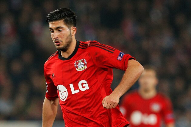 PARIS, FRANCE - MARCH 12: Emre Can of Leverkusen in action during the UEFA Champions League Round of 16 second leg match between Paris Saint-Germain FC and Bayer Leverkusen at Parc des Princes on March 12, 2014 in Paris, France.  (Photo by Dean Mouhtaropoulos/Getty Images)