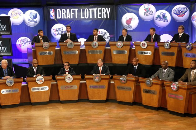 NBA basketball team representatives sit onstage at the start of the NBA draft lottery, Tuesday, May 21, 2013 in New York. (AP Photo/Jason DeCrow)