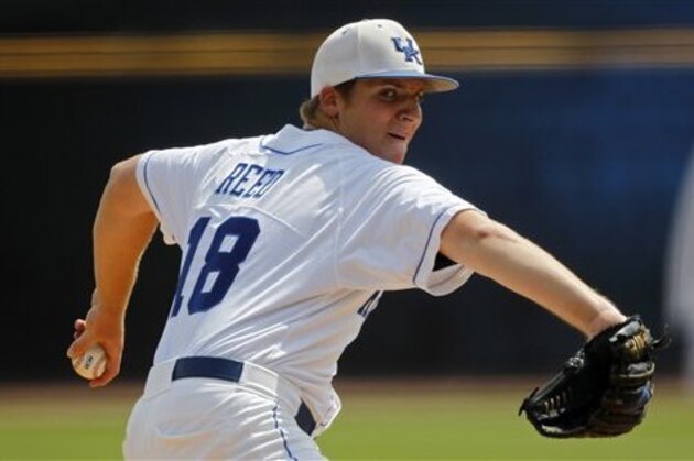 Kentucky's A.J. Reed pitches in the third inning of a 2-0 win over Mississippi in an NCAA college baseball game at the Southeastern Conference tournament in Hoover, Ala., Tuesday, May 22, 2012. (AP Photo/Dave Martin)