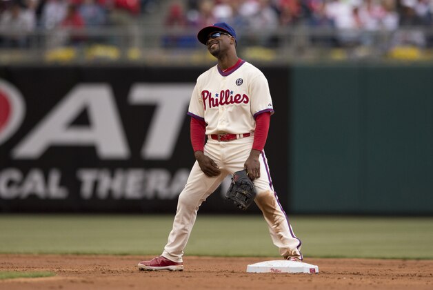 PHILADELPHIA, PA - MAY 4: Shortstop Jimmy Rollins #11 of the Philadelphia Phillies reacts after the challenged play did not go in the favor of his team in the top of the second inning against the Washington Nationals on May 4, 2014 at Citizens Bank Park in Philadelphia, Pennsylvania. (Photo by Mitchell Leff/Getty Images)