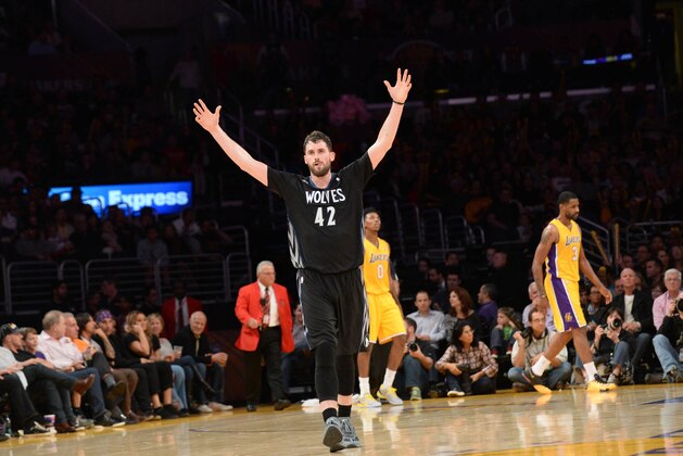LOS ANGELES, CA - DECEMBER 20: Kevin Love #42 of the Minnesota Timberwolves reacts during a game against the Los Angeles Lakers at Staples Center on December 20, 2013 in Los Angeles, California. NOTE TO USER: User expressly acknowledges and agrees that, by downloading and/or using this Photograph, user is consenting to the terms and conditions of the Getty Images License Agreement. Mandatory Copyright Notice: Copyright 2013 NBAE (Photo by Noah Graham/NBAE via Getty Images)