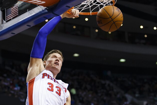 Mar 28, 2014; Auburn Hills, MI, USA; Detroit Pistons forward Jonas Jerebko (33) dunks in the second half against the Miami Heat at The Palace of Auburn Hills. Miami won 110-78. Mandatory Credit: Rick Osentoski-USA TODAY Sports