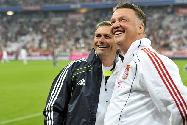 Munich's head coach Louis van Gaal, right, and Madrid's head coach Jose Mourinho looks on prior to their international friendly soccer match between FC Bayern Munich and  Real Madrid in Munich, southern Germany, Friday, Aug. 13, 2010. Fully 33 years later the farewell match will honor Franz Beckenbauer, who never received the honor when he left Munich to join the New York Cosmos, and later Hamburger SV. (AP Photo/Kerstin Joensson)