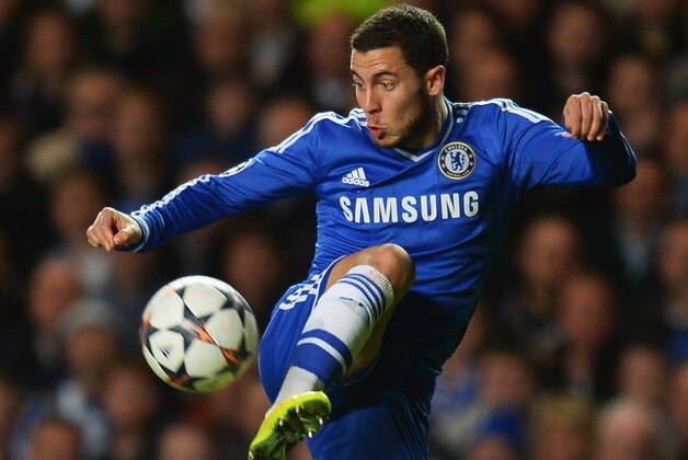 LONDON, ENGLAND - MARCH 18:  Eden Hazard of Chelsea controls the ball during the UEFA Champions League Round of 16 second leg match between Chelsea and Galatasaray AS at Stamford Bridge on March 18, 2014 in London, England.  (Photo by Mike Hewitt/Getty Images)