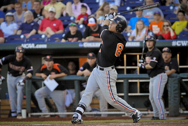 Jun 19, 2013; Omaha, NE, USA; Oregon State Beavers outfielder Michael Conforto (8) hits during their College World Series game against the Indiana Hoosiers at TD Ameritrade Park. Mandatory Credit: Dave Weaver-USA Today Sports