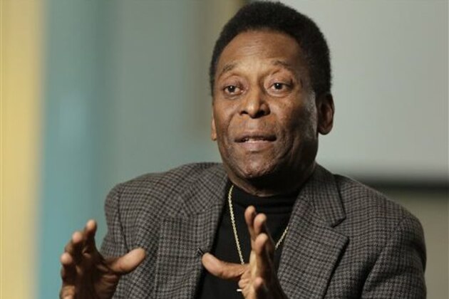 FILE  - In this April 2, 2014 file photo, Pele gestures during an interview at The Associated Press in New York. Brazil's World Cup ambassador says he's concerned about the country's outdated airports less than 10 weeks before the tournament begins.