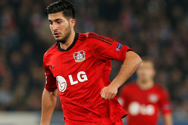 PARIS, FRANCE - MARCH 12: Emre Can of Leverkusen in action during the UEFA Champions League Round of 16 second leg match between Paris Saint-Germain FC and Bayer Leverkusen at Parc des Princes on March 12, 2014 in Paris, France.  (Photo by Dean Mouhtaropoulos/Getty Images)
