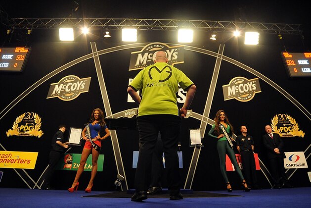 LONDON, ENGLAND - MAY 16: Michael Van Gerwen of Holland gets ready to throw during The Final against Phill Taylor of England during the McCoy's Premier League Darts Play-Offs at The O2 Arena on May 16, 2013 in London, England. (Photo by Charlie Crowhurst/Getty Images)