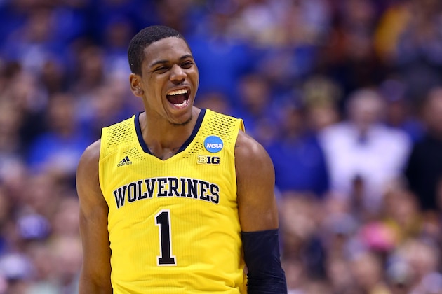 INDIANAPOLIS, IN - MARCH 30: Glenn Robinson III #1 of the Michigan Wolverines celebrates after a basket in the second half against the Kentucky Wildcats during the midwest regional final of the 2014 NCAA Men's Basketball Tournament at Lucas Oil Stadium on March 30, 2014 in Indianapolis, Indiana. (Photo by Andy Lyons/Getty Images) INDIANAPOLIS, IN - MARCH 30: Glenn Robinson III #1 of the Michigan Wolverines celebrates after a basket in the second half against the Kentucky Wildcats during the midwest regional final of the 2014 NCAA Men's Basketball Tournament at Lucas Oil Stadium on March 30, 2014 in Indianapolis, Indiana. (Photo by Andy Lyons/Getty Images)
