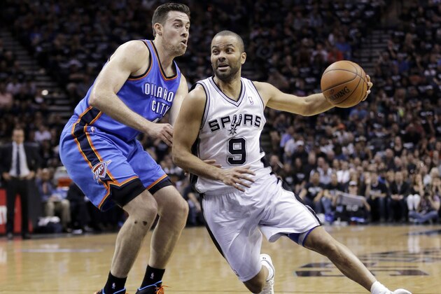 San Antonio Spurs' Tony Parker (9), of France, drives around Oklahoma City Thunder's Nick Collison during the first half of Game 1 of a Western Conference finals NBA basketball playoff series, Monday, May 19, 2014, in San Antonio. (AP Photo/Eric Gay)