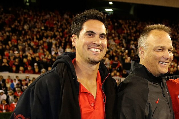 ATHENS, GA - NOVEMBER 23:  Quarterback Aaron Murray #11 of the Georgia Bulldogs poses with his family and Georgia head coach Mark Richt second from left) during Senior Day festivities before the game against the Kentucky Wildcats at Sanford Stadium on November 23, 2013 in Athens, Georgia.  (Photo by Mike Zarrilli/Getty Images)