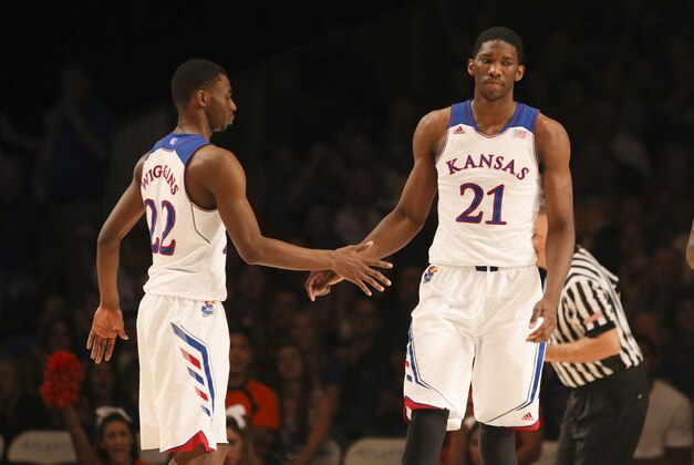 Nov 30, 2013; Paradise Island, BAHAMAS; Kansas Jayhawks guard Andrew Wiggins (22) and center Joel Embiid (21) react after a score during the game against the UTEP Miners at the 2013 Battle 4 Atlantis in the Imperial Arena at the Atlantis Resort. Mandatory Credit: Kevin Jairaj-USA TODAY Sports