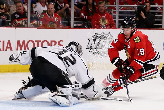 CHICAGO, IL - MAY 18:  Jonathan Quick #32 of the Los Angeles Kings defends against Jonathan Toews #19 of the Chicago Blackhawks in Game One of the Western Conference Final during the 2014 Stanley Cup Playoffs at United Center on May 18, 2014 in Chicago, Illinois.  (Photo by Jonathan Daniel/Getty Images)