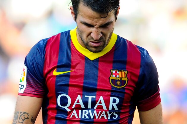 ELCHE, SPAIN - MAY 11:  Cesc Fabregas of FC Barcelona looks down during the La Liga match between Elche FC and FC Barcelona at Estadio Manuel Martinez Valero on May 11, 2014 in Elche, Spain.  (Photo by David Ramos/Getty Images)