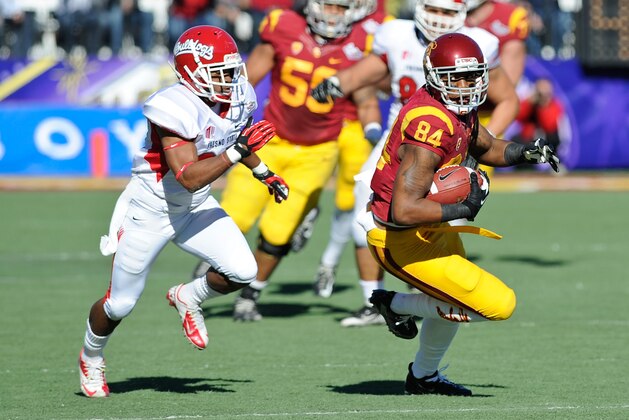 Southern California wide receiver Darreus Rogers (84) runs after catching the ball against Fresno State in the first quarter of the Las Vegas Bowl NCAA college football game, Saturday, Dec. 21, 2013, in Las Vegas. USC won 45-20. (AP Photo/David Cleveland)