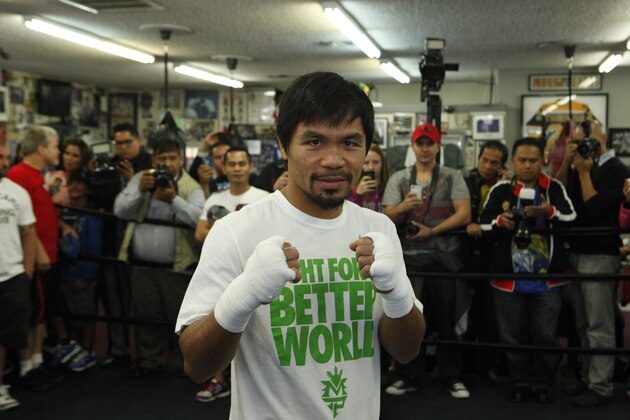 HOLLYWOOD, CA - APRIL 2:  Boxer Manny Pacquiao poses for a photo during a media workout at the Wild Card Boxing Gym on April 2, 2014 in Hollywood, California (Photo by Alexis Cuarezma/Getty Images)