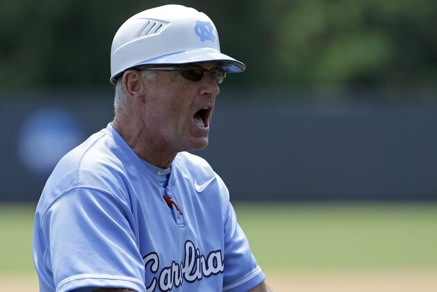 North Carolina head coach Mike Fox yells during an NCAA tournament super regional baseball game against South Carolina in Chapel Hill, N.C., Tuesday, June 11, 2013. (AP Photo/Gerry Broome)