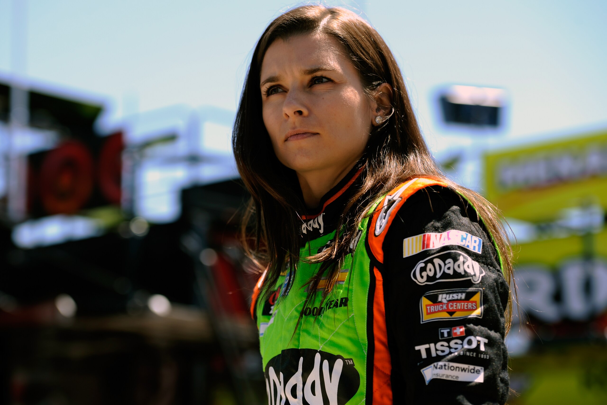 KANSAS CITY, KS - MAY 09:  Danica Patrick, driver of the #10 GoDaddy Chevrolet, stands in the garage area during practice for the NASCAR Sprint Cup Series 5-Hour Energy 400 at Kansas Speedway on May 9, 2014 in Kansas City, Kansas.  (Photo by Jared C. Tilton/Getty Images)