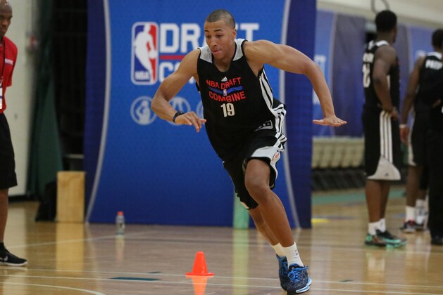 CHICAGO, IL - May 16:  Dante Exum participates in drills during the 2014 Draft Combine on May 16, 2014 at Quest Multisport in Chicago, Illinois. NOTE TO USER:  User expressly acknowledges and agrees that, by downloading and or using this Photograph, user is consenting to the terms and conditions of the Getty Images License Agreement.  Mandatory Copyright Notice:  Copyright 2014 NBAE (Photo by Gary Dineen/NBAE via Getty Images)