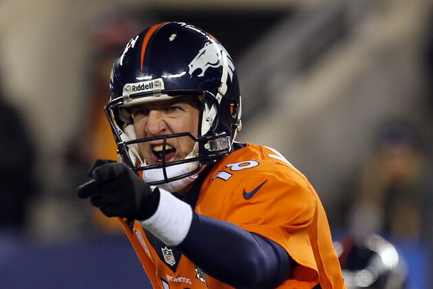 EAST RUTHERFORD, NJ - FEBRUARY 02:  Quarterback Peyton Manning #18 of the Denver Broncos calls a play against the Seattle Seahawks during Super Bowl XLVIII at MetLife Stadium on February 2, 2014 in East Rutherford, New Jersey.  (Photo by Kevin C. Cox/Getty Images)
