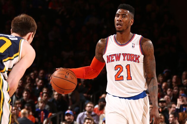 NEW YORK, NY - MARCH 7: Iman Shumpert #21 of the New York Knicks handles the ball against the Utah Jazz on March 7, 2014.  NOTE TO USER: User expressly acknowledges and agrees that, by downloading and or using this photograph, User is consenting to the terms and conditions of the Getty Images License Agreement. Mandatory Copyright Notice: Copyright 2014 NBAE  (Photo by Nathaniel S. Butler/NBAE via Getty Images)