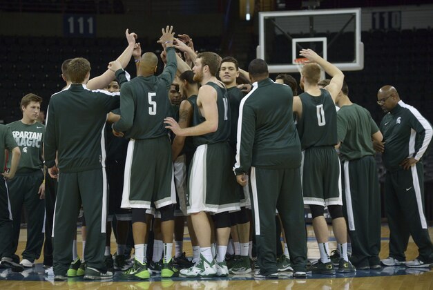 Mar 19, 2014; Spokane, WA, USA; Michigan State Spartans players huddle during practice before the second round of the 2014 NCAA Tournament at Veterans Memorial Arena. Mandatory Credit: Kirby Lee-USA TODAY Sports