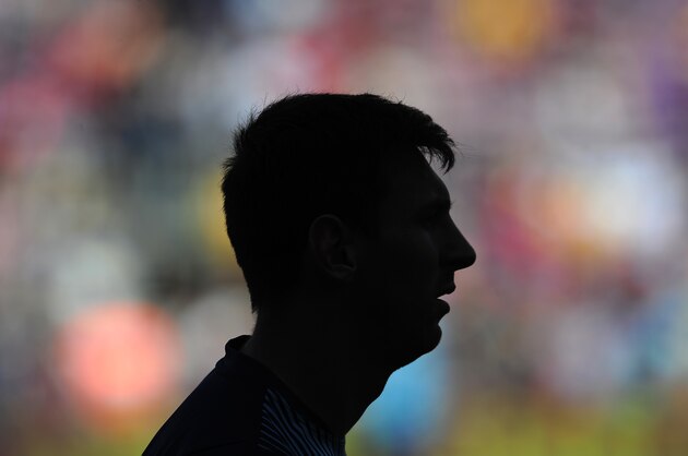 FC Barcelona's Lionel Messi, from Argentina, looks on prior to the Spanish La Liga soccer match between FC Barcelona and Getafe at the Camp Nou stadium in Barcelona, Spain, Saturday, May 3, 2014. (AP Photo/Manu Fernandez)