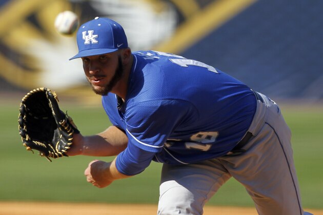 Kentucky's A.J. Reed (18) pitches against Alabama during the 1st inning at the Southeastern Conference NCAA college baseball tournament on Tuesday, May 20, 2014, in Hoover, Ala. (AP Photo/Butch Dill)