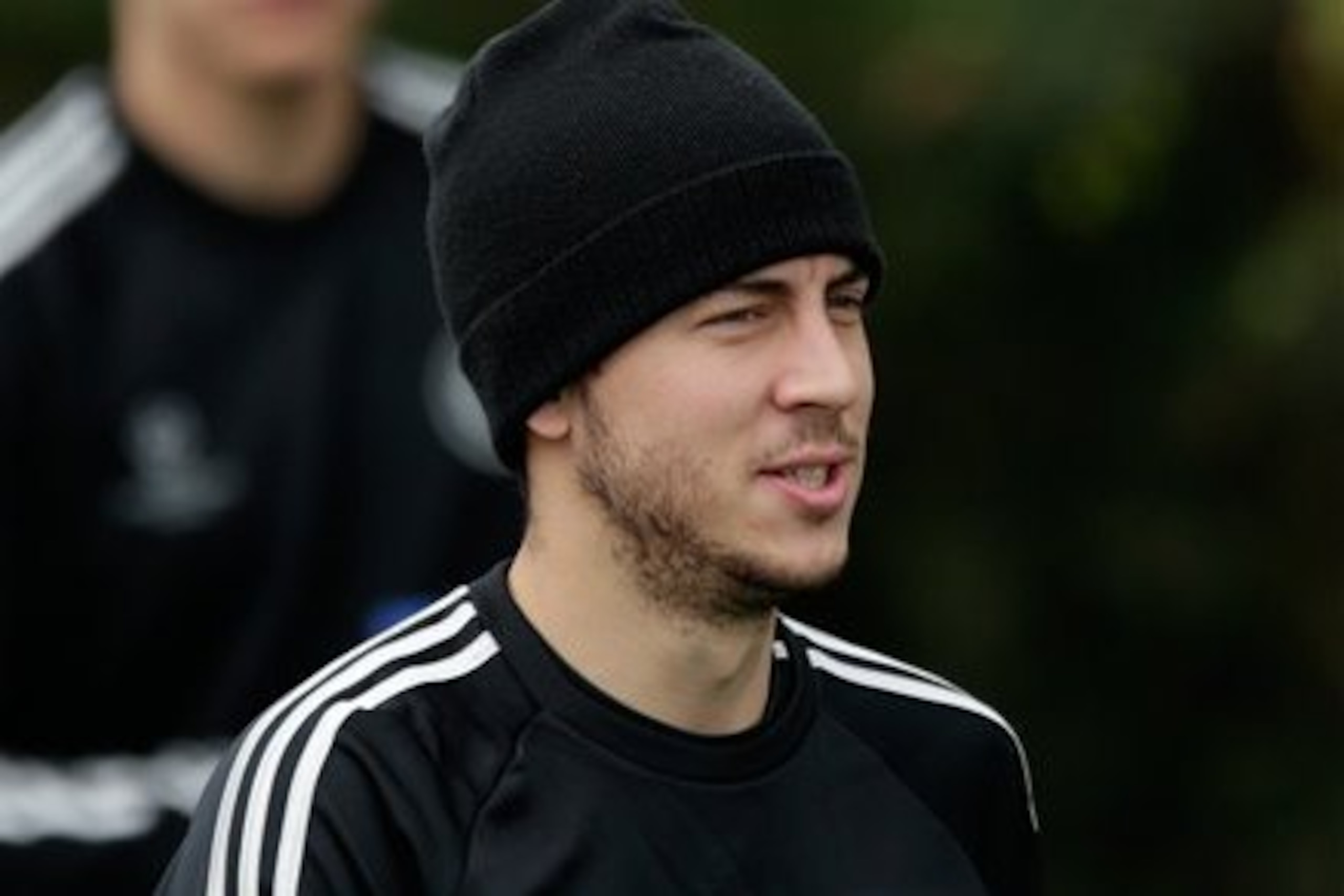 Chelsea's Eden Hazard arrives for a training session at their facilities in Stoke d'Abernon, near London, Monday, April 7, 2014.  Paris Saint-Germain take a 3-1 lead from the first leg into their second leg Champions League quarterfinal soccer match against Chelsea on Tuesday.  (AP Photo/Matt Dunham).