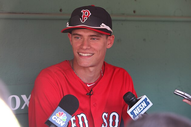BOSTON, MA - JUNE 19:  Trey Ball of the Boston Red Sox, seventh overall draft pick, meets the media in the Red Sox dugout before a game against the Tampa Bay Rays on June 19, 2013 in Boston, Massachusetts. (Photo by Gail Oskin/Getty Images)