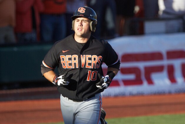 June 9, 2013; Corvallis, OR, USA; Oregon State Beavers player Dylan Davis (10) rounds the bases after hitting a home run against the Kansas State Wildcats in the first inning of the Corvallis Super Regional at Goss Stadium.  Mandatory Credit: Jaime Valdez-USA TODAY Sports