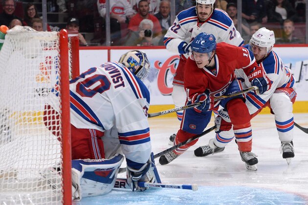 MONTREAL, QC - MAY 19: Henrik Lundqvist #30, Ryan McDonagh #27 and Brian Boyle #22 of the New York Rangers protect the net against Brendan Gallagher #11 of the Montreal Canadiens in Game Two of the Eastern Conference Final during the 2014 NHL Stanley Cup Playoffs at the Bell Centre on May 19, 2014 in Montreal, Quebec, Canada. (Photo by Francois Lacasse/NHLI via Getty Images)