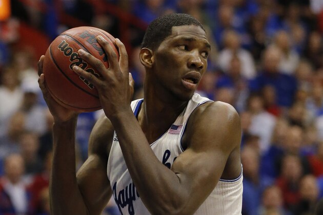 Kansas center Joel Embiid during the second half of an NCAA college basketball game against Baylor in Lawrence, Kan., Monday, Jan. 20, 2014. Kansas defeated Baylor 78-68. (AP Photo/Orlin Wagner)