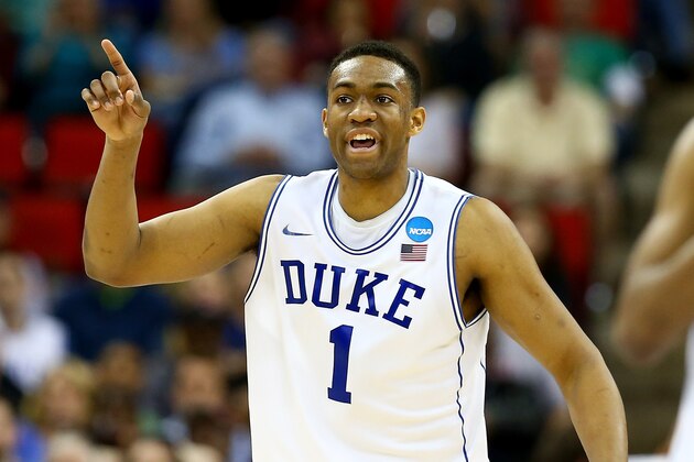 RALEIGH, NC - MARCH 21:  Jabari Parker #1 of the Duke Blue Devils reacts in the second half against the Mercer Bears in the second round of the 2014 NCAA Men's Basketball Tournament at PNC Arena on March 21, 2014 in Raleigh, North Carolina.  (Photo by Streeter Lecka/Getty Images)